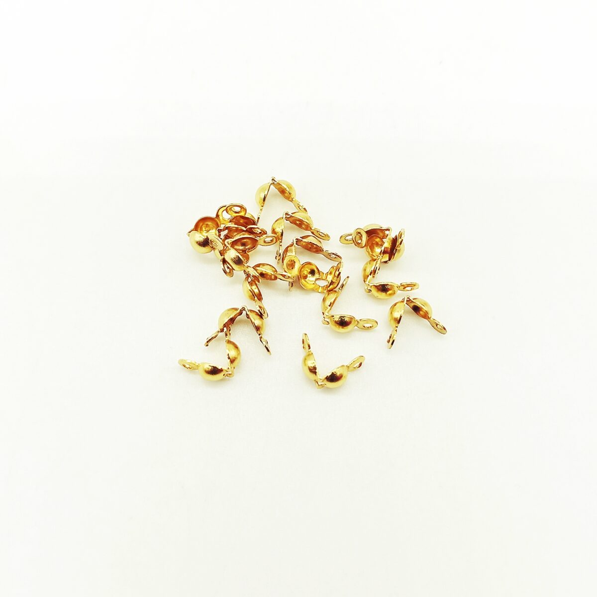 coprischiaccino in acciaio dorato 8 x 4 mm
