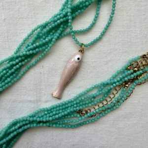 Collana in acciaio dorato con cristallo acqua di sardegna