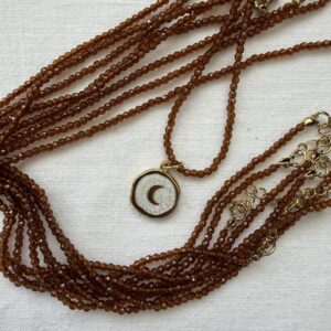 Collana in acciaio dorato con cristallo cognac