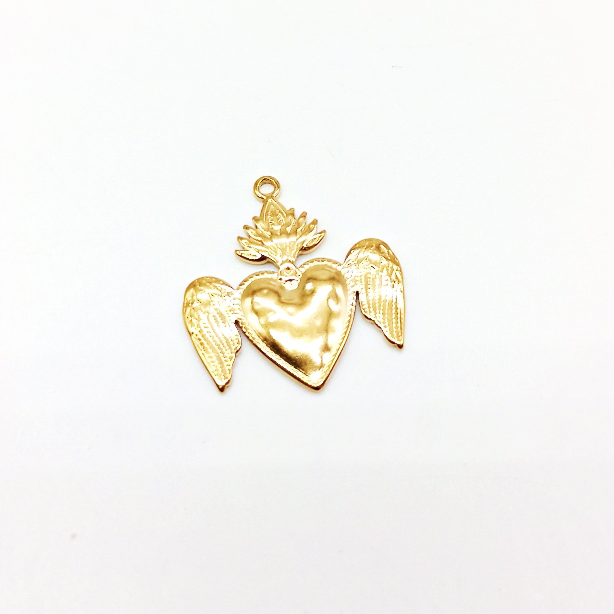 Cuore sacro acciaio dorato con ali