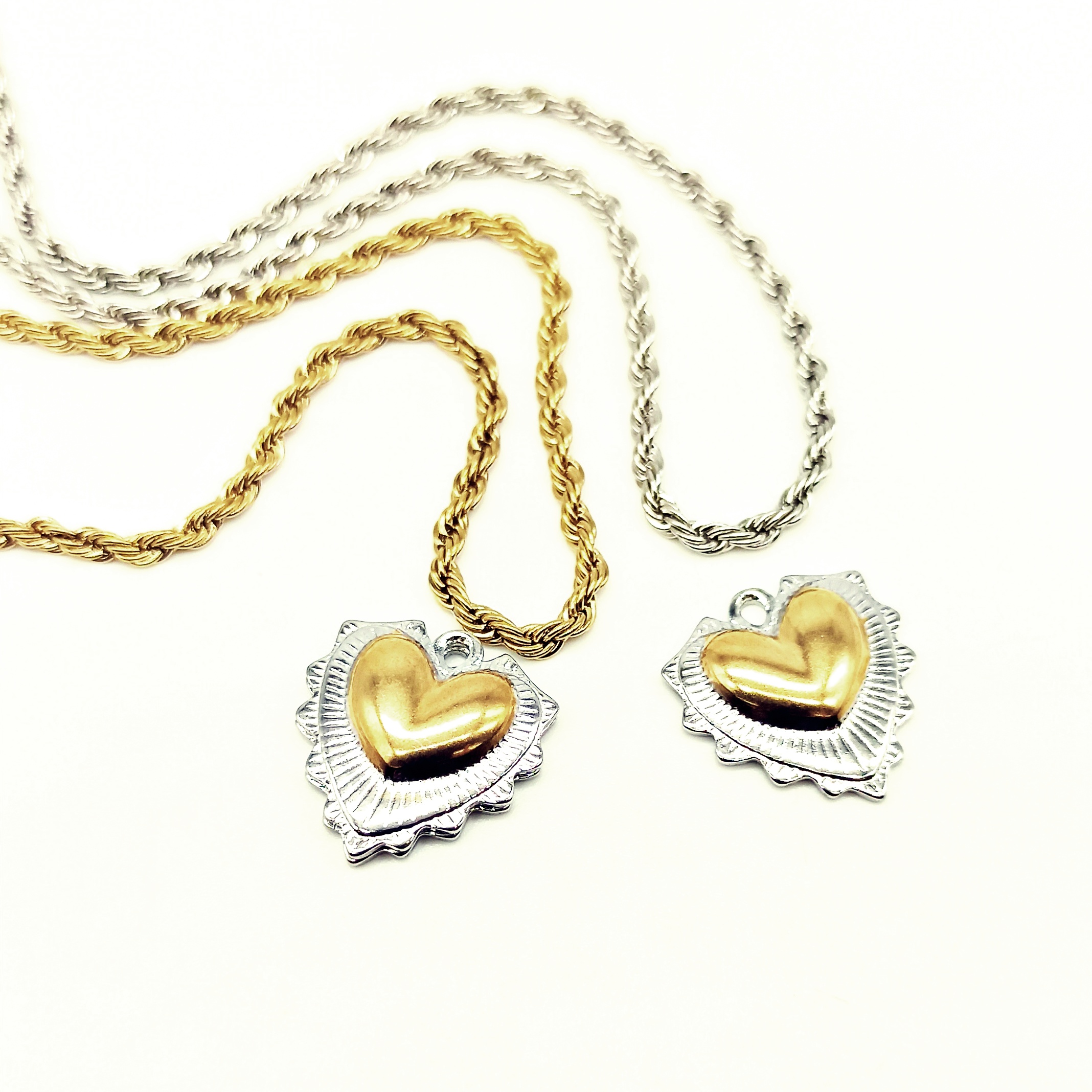 Ciondolo cuore sacro acciaio bicolor - immagine 2