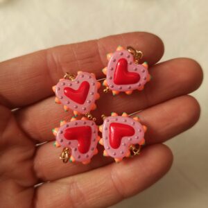 Alternative view of Ciondolo cuore sacro rosa in ceramica e acciaio