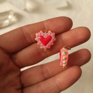 Ciondolo cuore sacro rosa in ceramica e acciaio