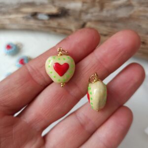 Ciondolo cuore giallo in ceramica e acciaio