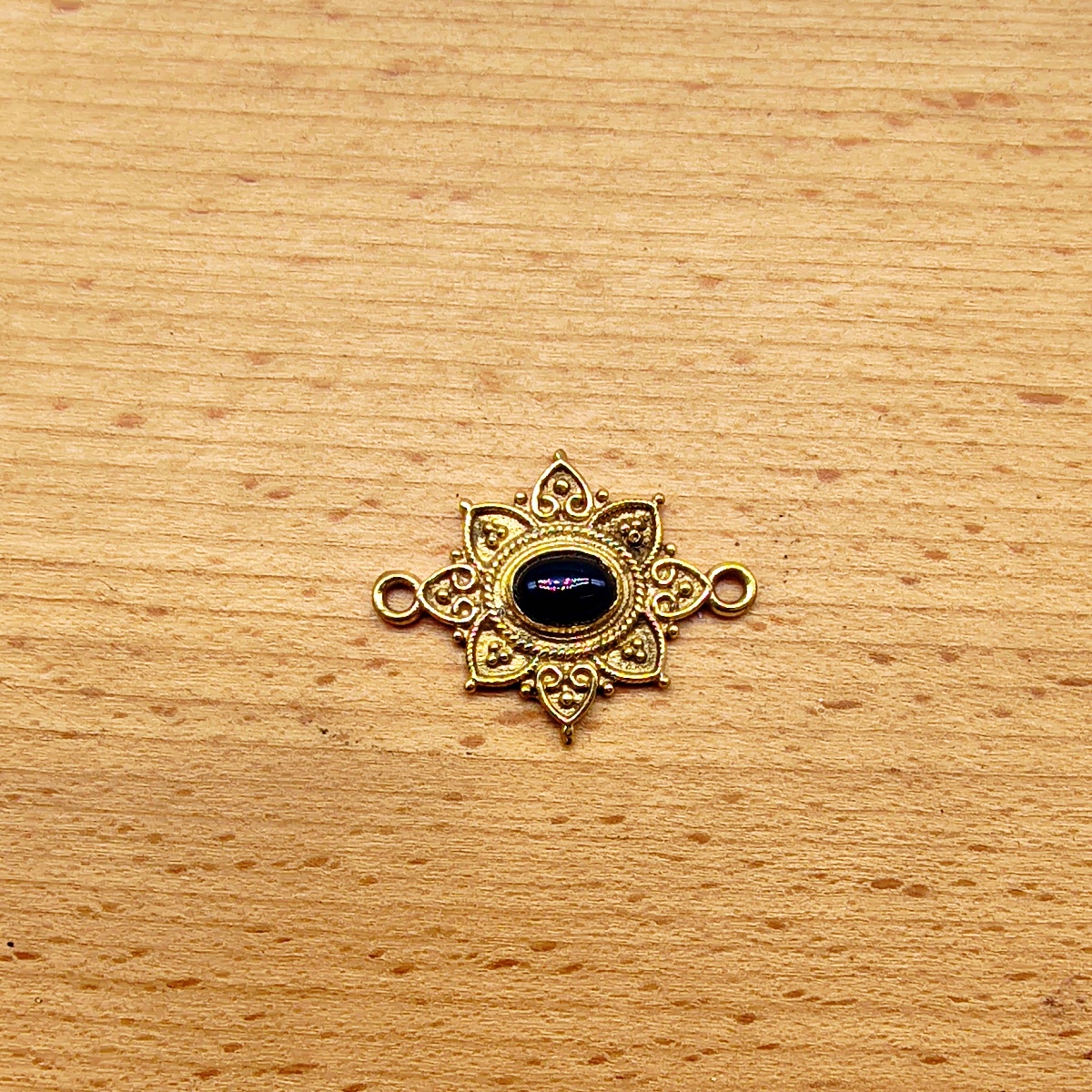 Connettore ottone ovale decorato onice nero