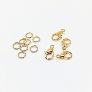 Set di chiusure in acciaio dorato con 4 moschettoni da 9 mm e 8 anelline da 5 mm